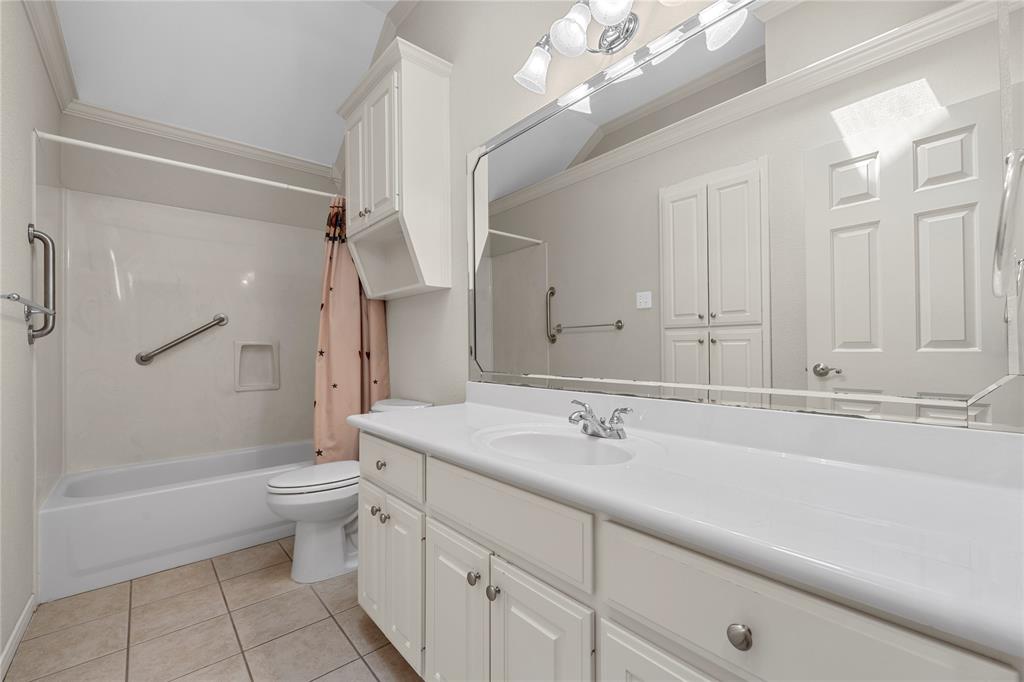 1209 Stonehill Circle Hewitt, TX 76643 - Photo 14 of 24 a bathroom with a sink a toilet and shower