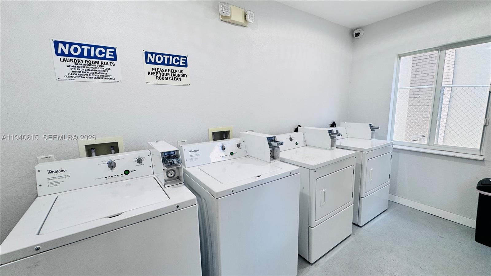 1737 Northwest 3rd Avenue, Unit 7 Miami, FL 33136 - Photo 9 of 9 a utility room with dryer and washer