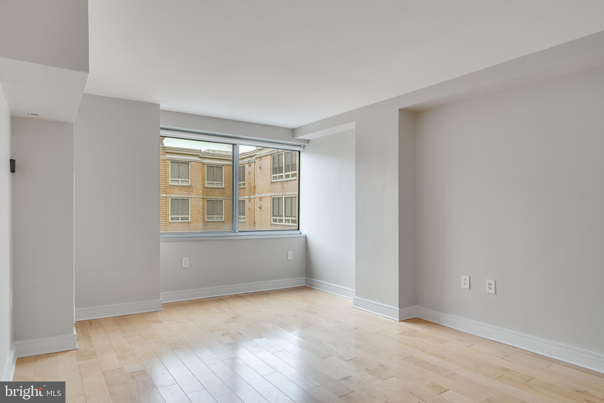 800 4th Street Southwest, Unit S418 Washington, DC 20024 - Photo 6 of 22 a view of an empty room with a window