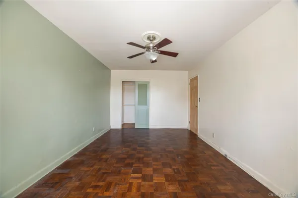 a view of a chandelier fan in a room
