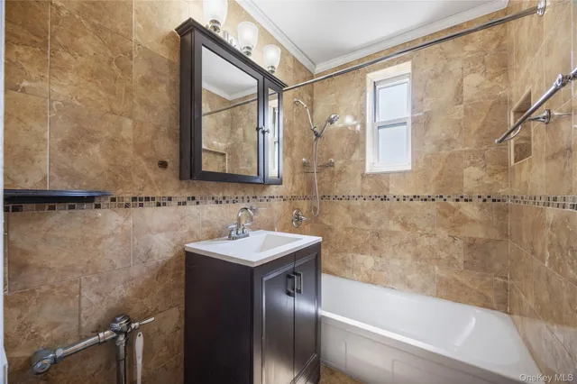 a bathroom with a sink and a bathtub
