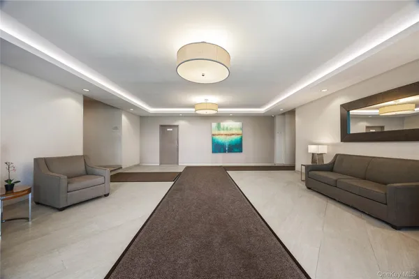 a view of a livingroom with furniture and wooden floor