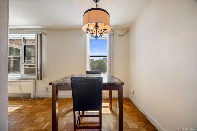 a dining room with table and chair