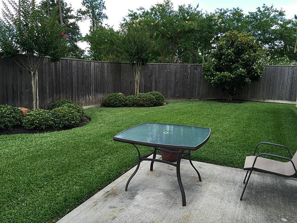 1602 Eden Meadows Drive Spring, TX 77386 - Photo 19 of 25 a view of a backyard with furniture