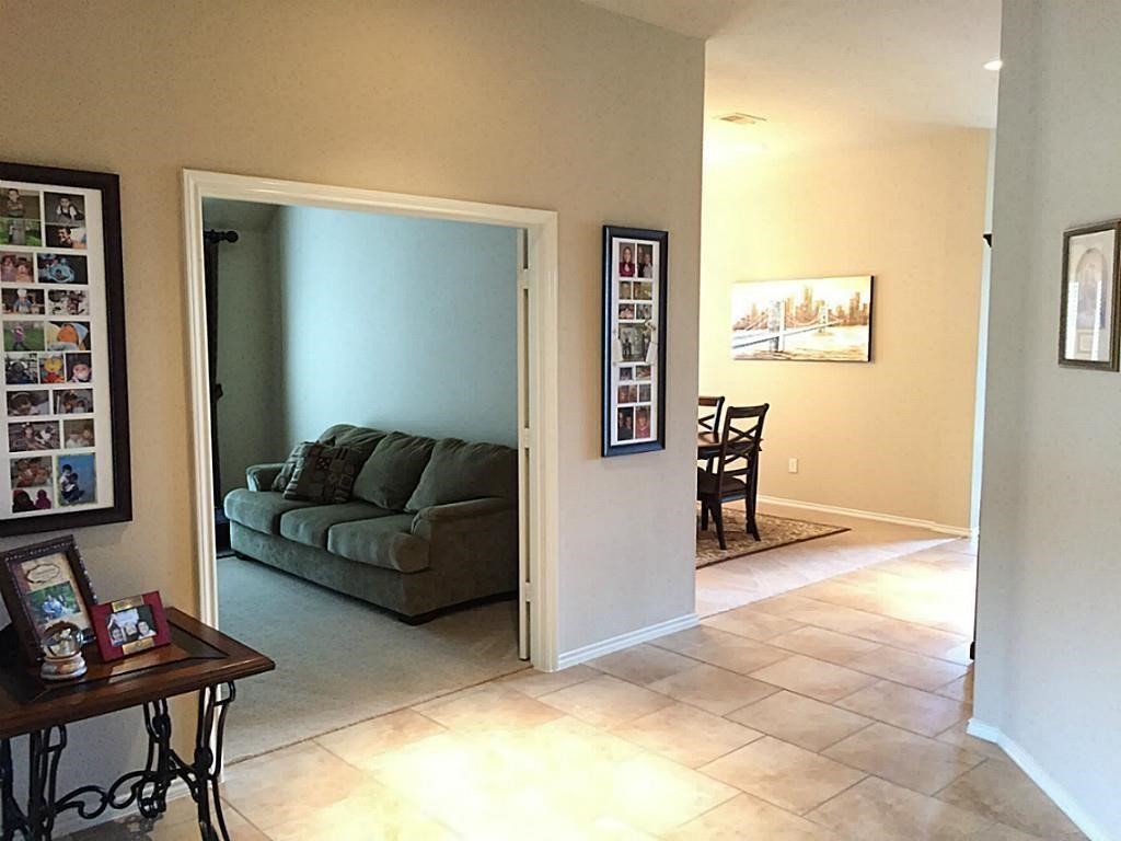 1602 Eden Meadows Drive Spring, TX 77386 - Photo 5 of 25 a living room with furniture and a window
