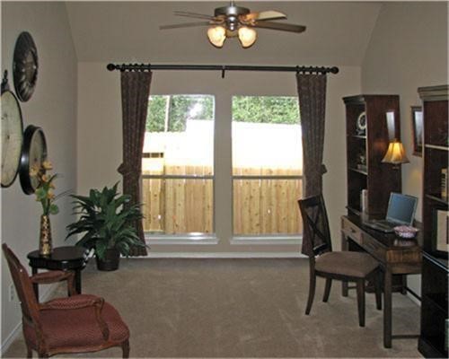 1602 Eden Meadows Drive Spring, TX 77386 - Photo 6 of 25 a living room with furniture and a floor to ceiling window
