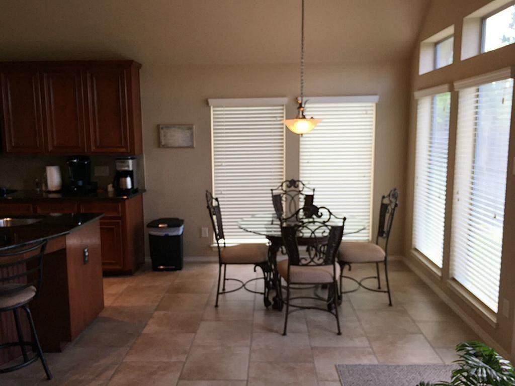 1602 Eden Meadows Drive Spring, TX 77386 - Photo 10 of 25 a dining room with furniture and window