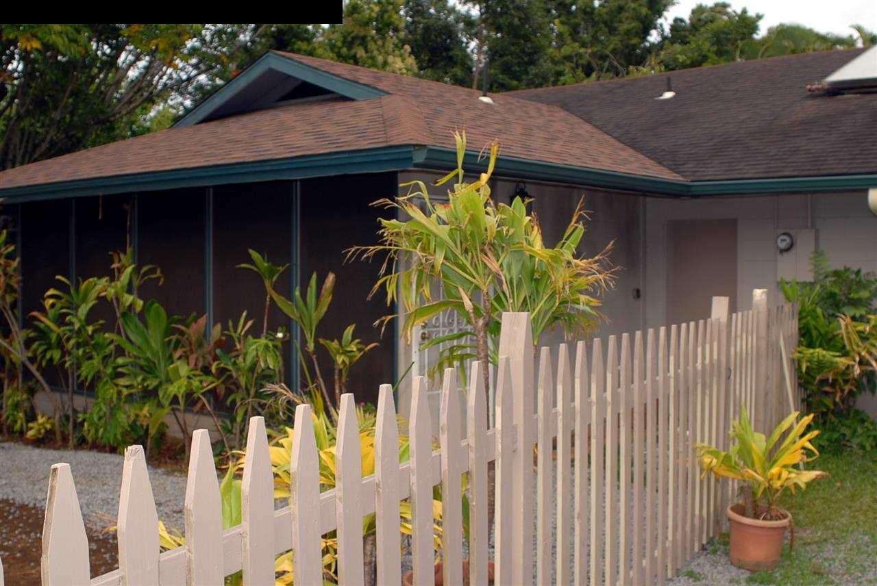 1765 Haiku Road Haiku, HI 96708 - Photo 1 of 25 a view of a house with wooden fence