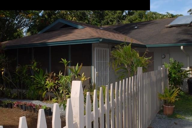 1765 Haiku Road Haiku, HI 96708 - Photo 15 of 25 a view of a house with a small yard and plants