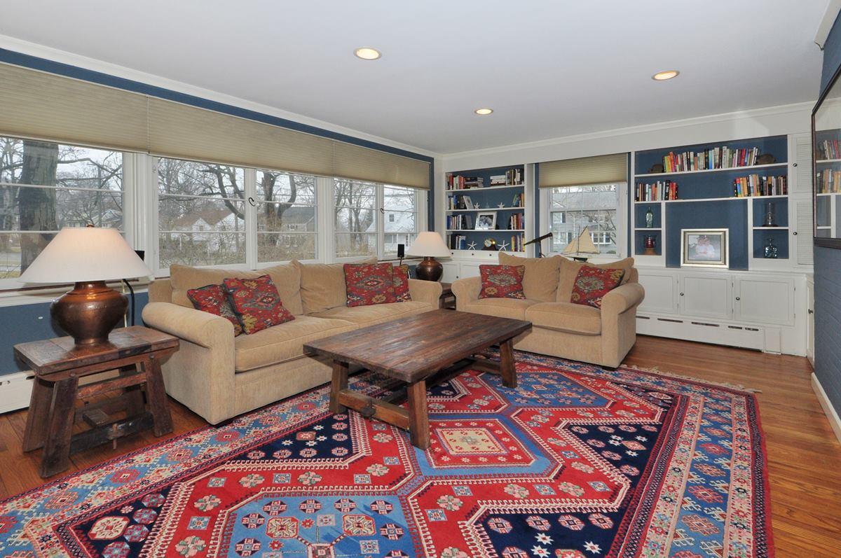 112 Hollow Tree Ridge Road Darien, CT 06820 - Photo 15 of 27 a living room with furniture and a window