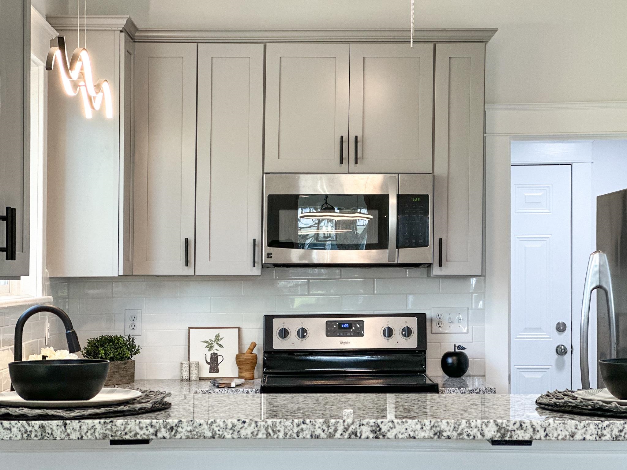 417 Cedar Green Road Staunton, VA 24401 - Photo 30 of 53 a kitchen with stainless steel appliances granite countertop a sink and cabinets