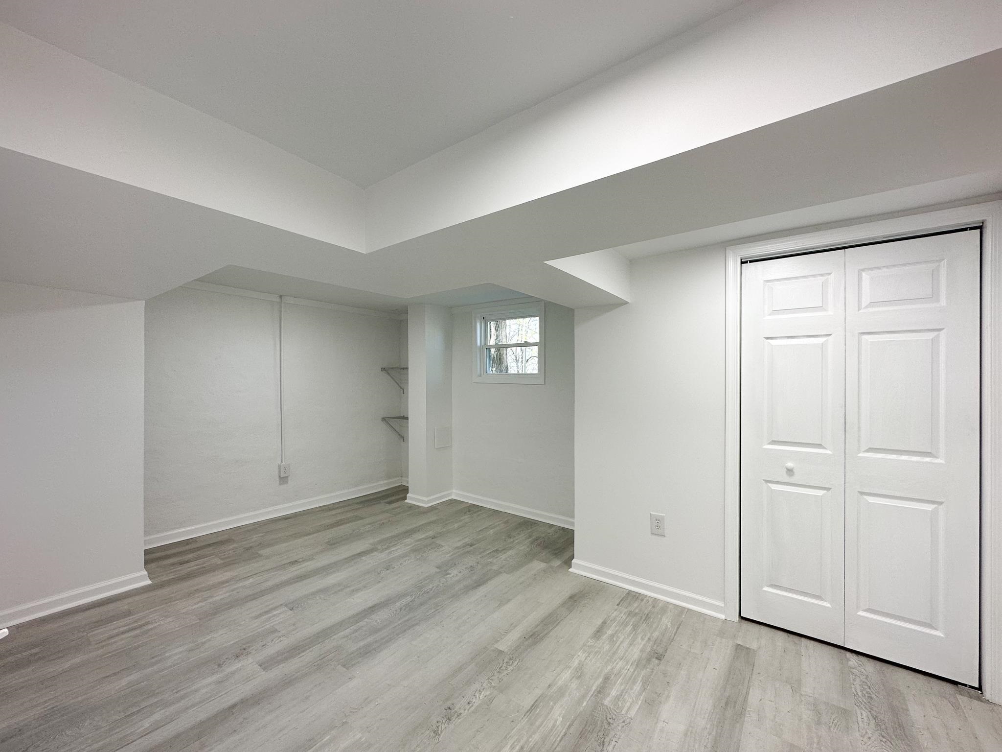 417 Cedar Green Road Staunton, VA 24401 - Photo 47 of 53 an empty room with wooden floor and windows