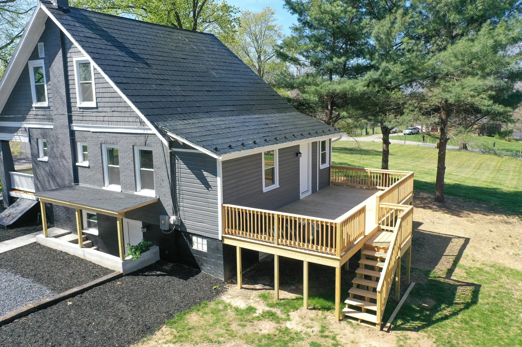 417 Cedar Green Road Staunton, VA 24401 - Photo 10 of 53 a view of a house with backyard porch and sitting area