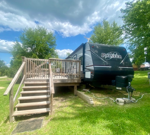 25-126 Woodhaven Sublette, IL 61367 - Photo 2 of 17 a view of house with swimming pool and sitting area