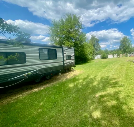 a view of a backyard with a garden
