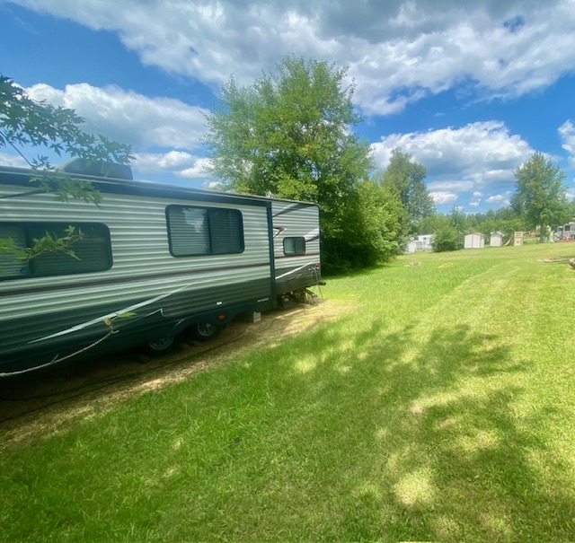 25-126 Woodhaven Sublette, IL 61367 - Photo 7 of 17 a view of a backyard with a garden