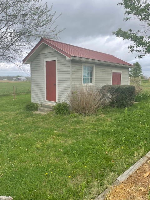 108 Bud Taylor Road Ethridge, TN 38456 - Photo 12 of 28 a front view of house with yard and green space