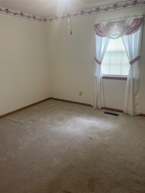 108 Bud Taylor Road Ethridge, TN 38456 - Photo 14 of 28 a view of a room with racks on the wall