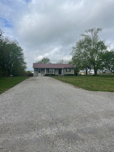 108 Bud Taylor Road Ethridge, TN 38456 - Photo 2 of 28 a view of swimming pool is middle in big yard with large trees