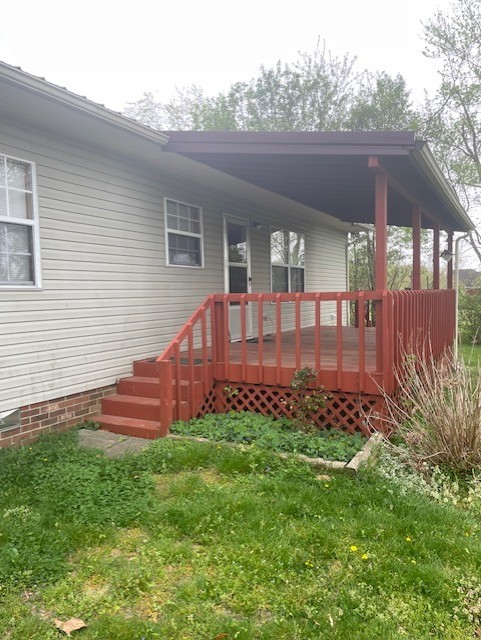 108 Bud Taylor Road Ethridge, TN 38456 - Photo 8 of 28 a view of a house with a backyard