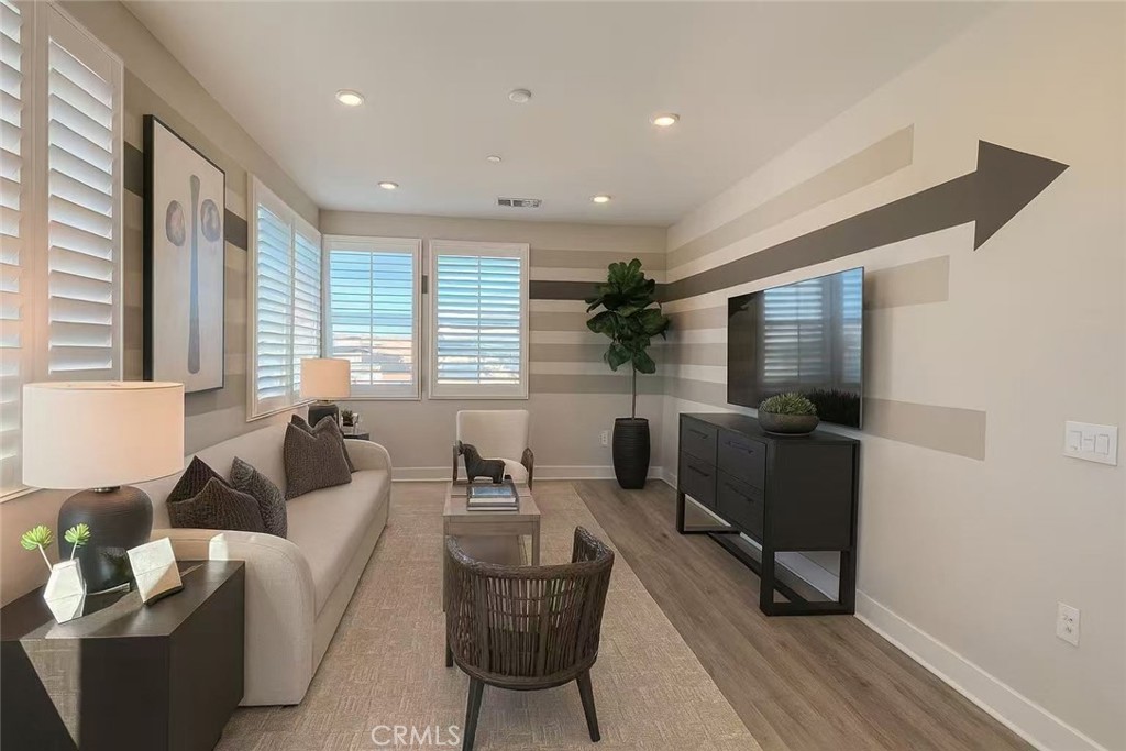 609 Gadwall Irvine, CA 92618 - Photo 5 of 10 a living room with furniture and a window
