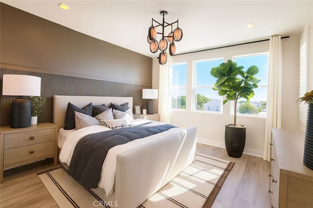 609 Gadwall Irvine, CA 92618 - Photo 6 of 10 a bedroom with bed and a window