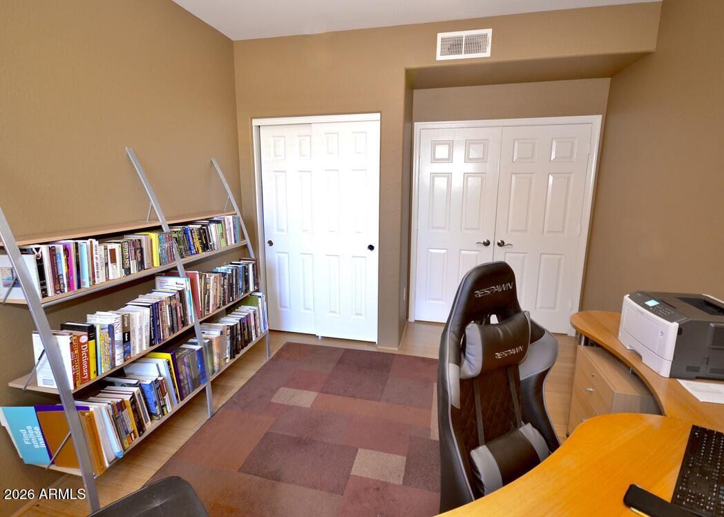 5303 North 7th Street, Unit 117 Phoenix, AZ 85014 - Photo 12 of 31 a view of a livingroom with furniture and entryway