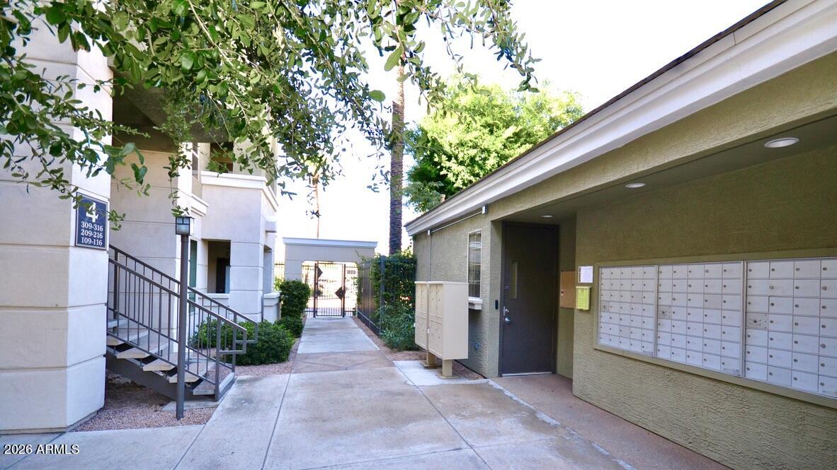 5303 North 7th Street, Unit 117 Phoenix, AZ 85014 - Photo 28 of 31 a view of a porch with a tree