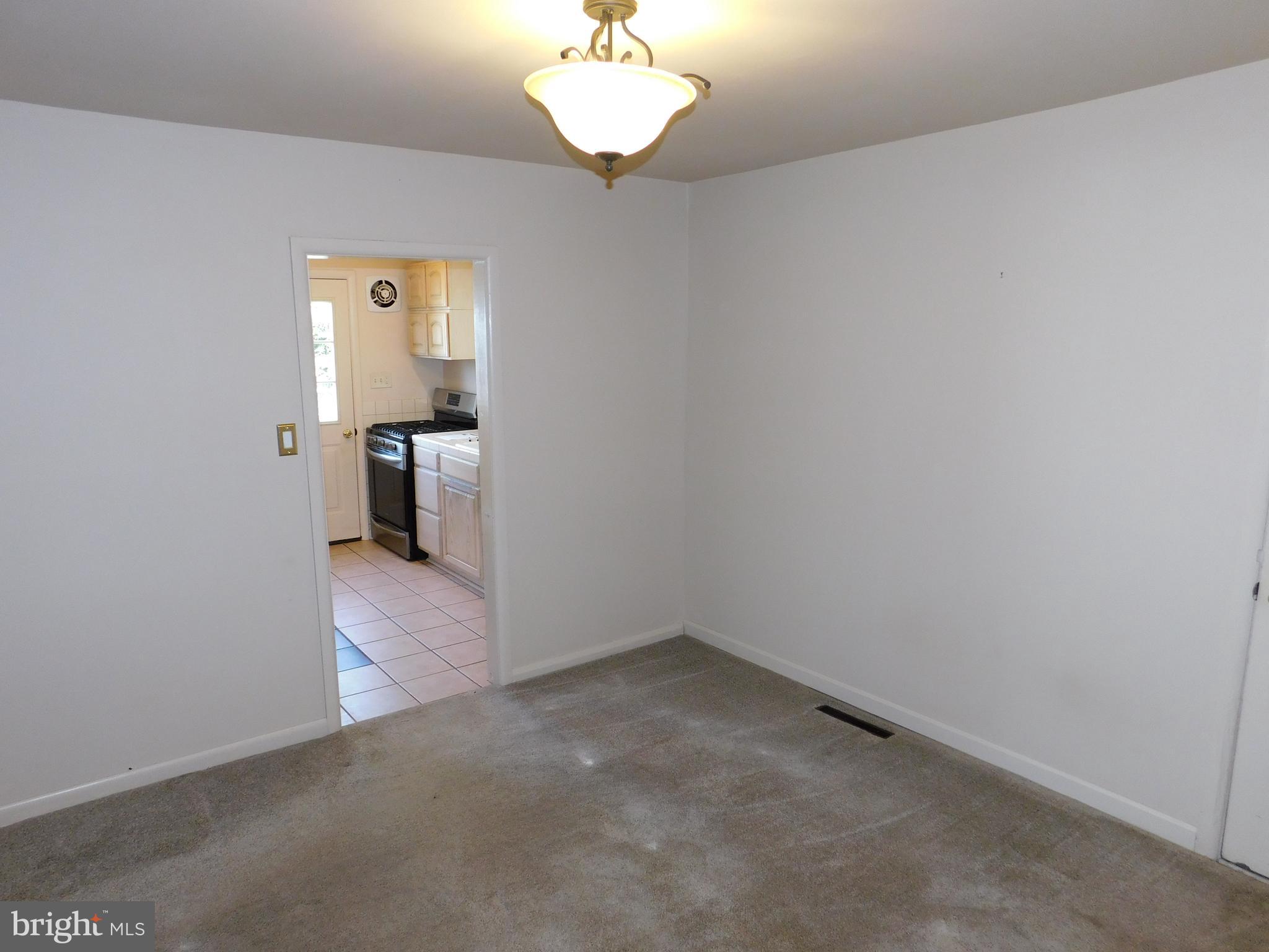 4720 Mawani Road Baltimore, MD 21206 - Photo 6 of 34 Dining Room to Kitchen