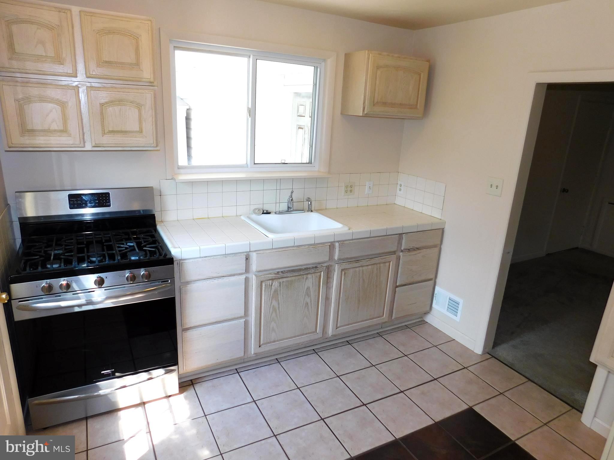 4720 Mawani Road Baltimore, MD 21206 - Photo 9 of 34 Kitchen has a Large Sink