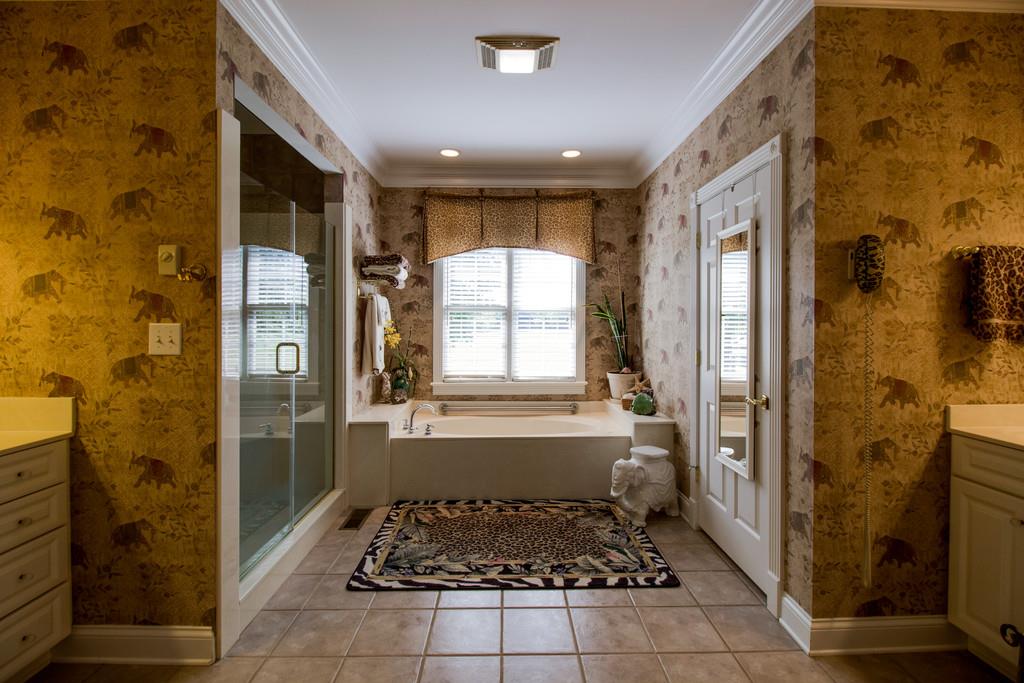4670 Murfreesboro Road Franklin, TN 37067 - Photo 14 of 30 a bathroom with a glass door shower