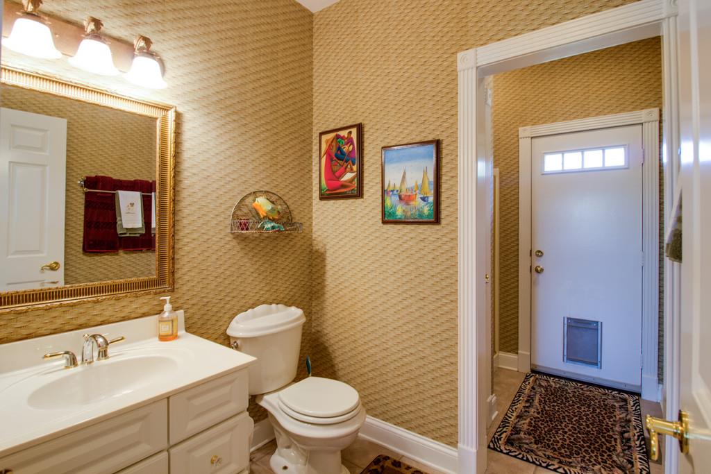 4670 Murfreesboro Road Franklin, TN 37067 - Photo 16 of 30 a bathroom with a sink and a mirror