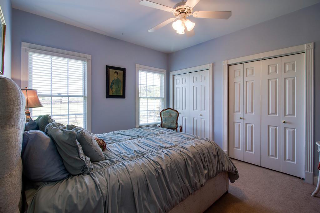 4670 Murfreesboro Road Franklin, TN 37067 - Photo 19 of 30 a bedroom with a bed and window