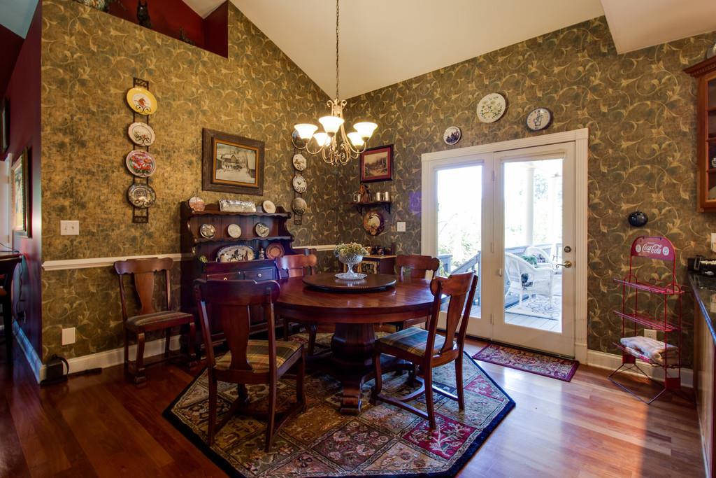 4670 Murfreesboro Road Franklin, TN 37067 - Photo 23 of 30 a view of a dining room with furniture and chandelier