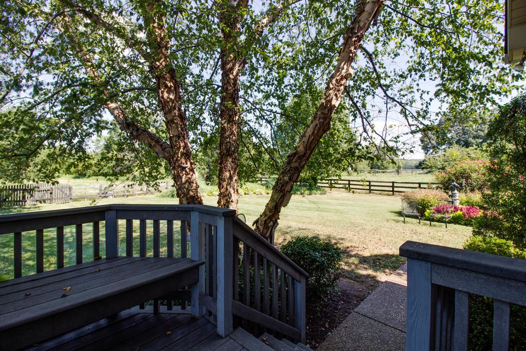4670 Murfreesboro Road Franklin, TN 37067 - Photo 29 of 30 a view of a wooden deck and a yard with wooden fence