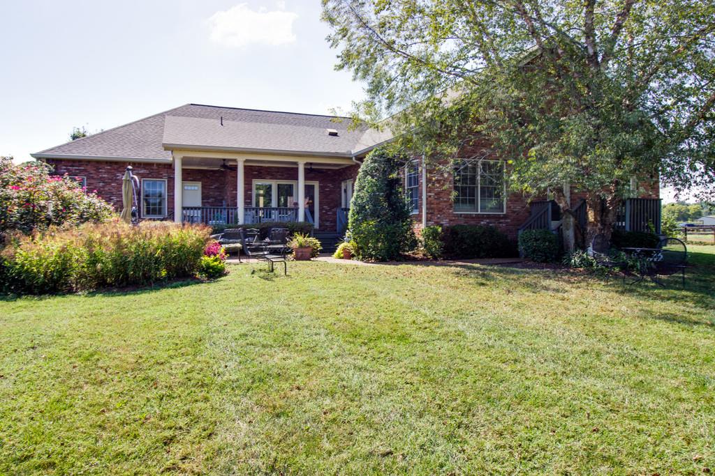 4670 Murfreesboro Road Franklin, TN 37067 - Photo 30 of 30 a view of a house with backyard porch and sitting area