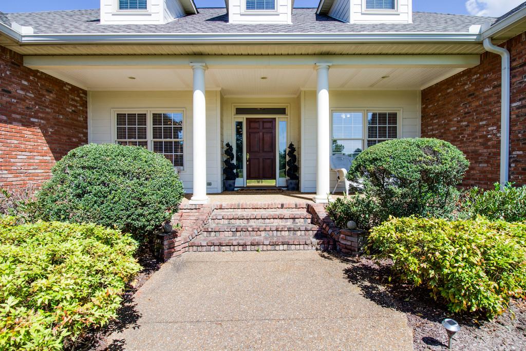 4670 Murfreesboro Road Franklin, TN 37067 - Photo 3 of 30 a view of a house with potted plants