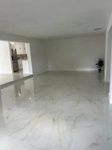 a view of a livingroom with a window