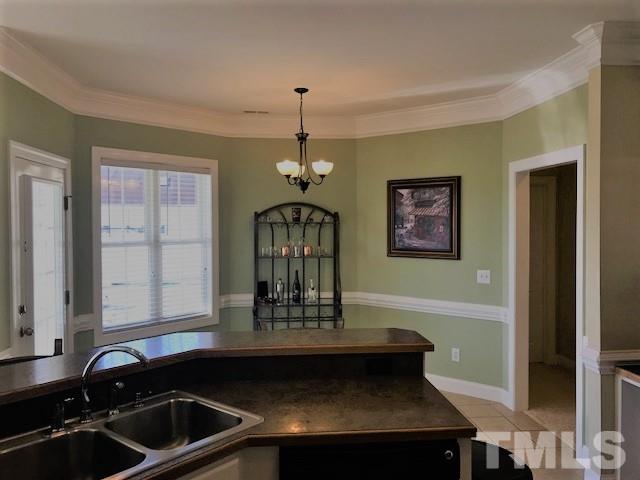 11539 Rockside Road Middlesex, NC 27557 - Photo 8 of 25 a kitchen with a sink and a window
