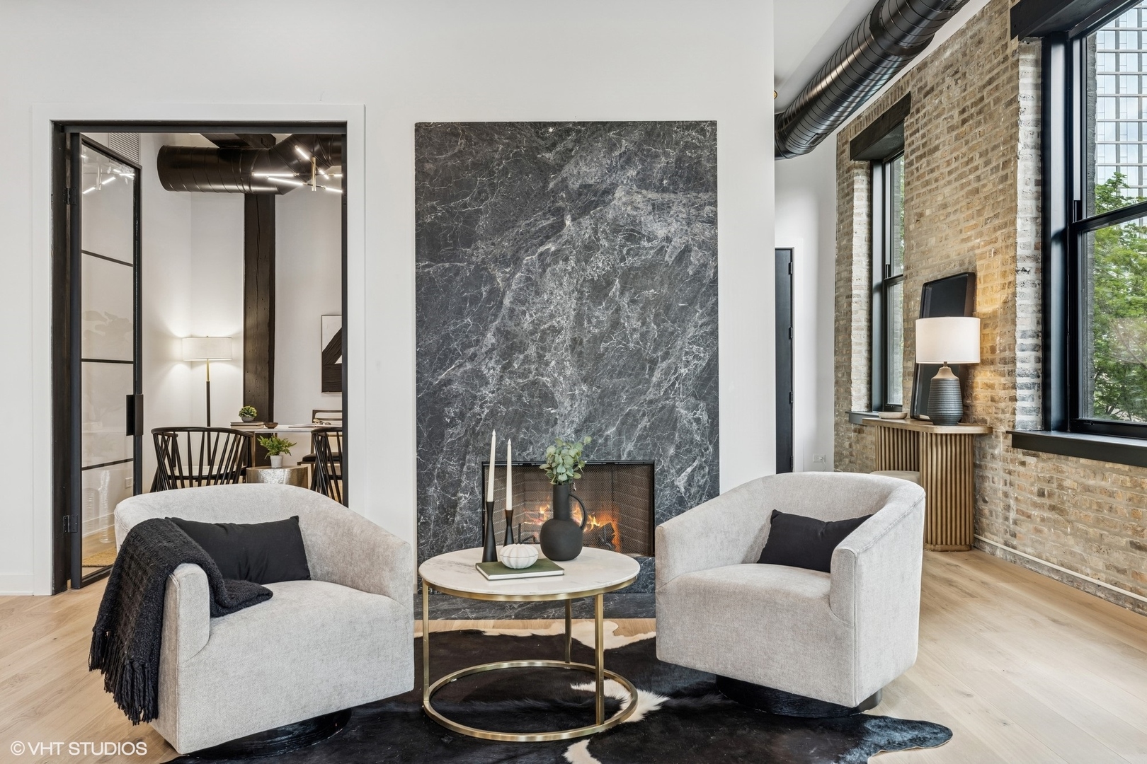 401 North Aberdeen Street, Unit 2N Chicago, IL 60642 - Photo 20 of 37 a living room with furniture and a fireplace