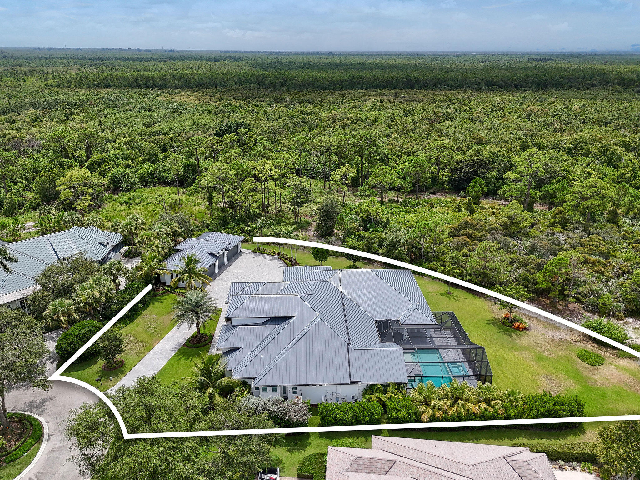 6219 Southeast Moss Ridge Pointe Hobe Sound, FL 33455 - Photo 103 of 108 an aerial view of a house