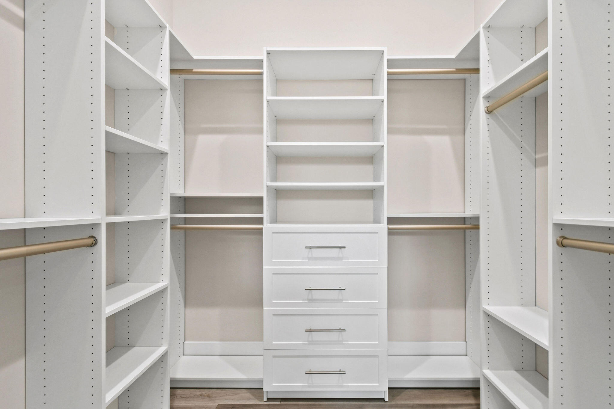 6219 Southeast Moss Ridge Pointe Hobe Sound, FL 33455 - Photo 29 of 108 a view of walk in closet with empty racks