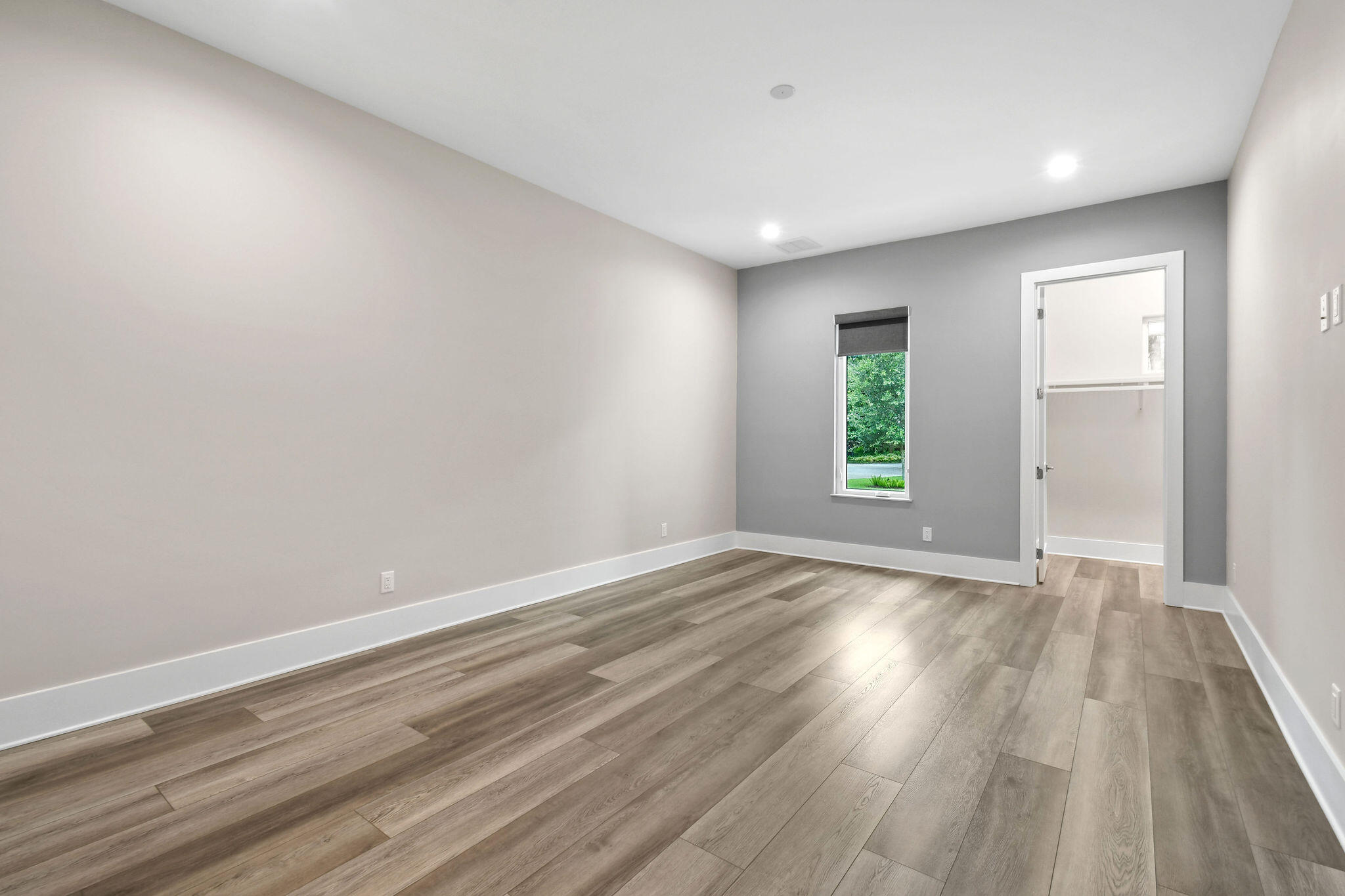 6219 Southeast Moss Ridge Pointe Hobe Sound, FL 33455 - Photo 44 of 108 a view of an empty room with wooden floor and a window