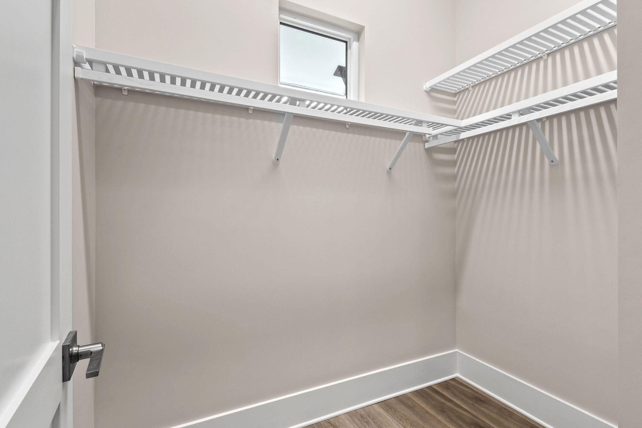 6219 Southeast Moss Ridge Pointe Hobe Sound, FL 33455 - Photo 46 of 108 a view of a room with racks on the wall