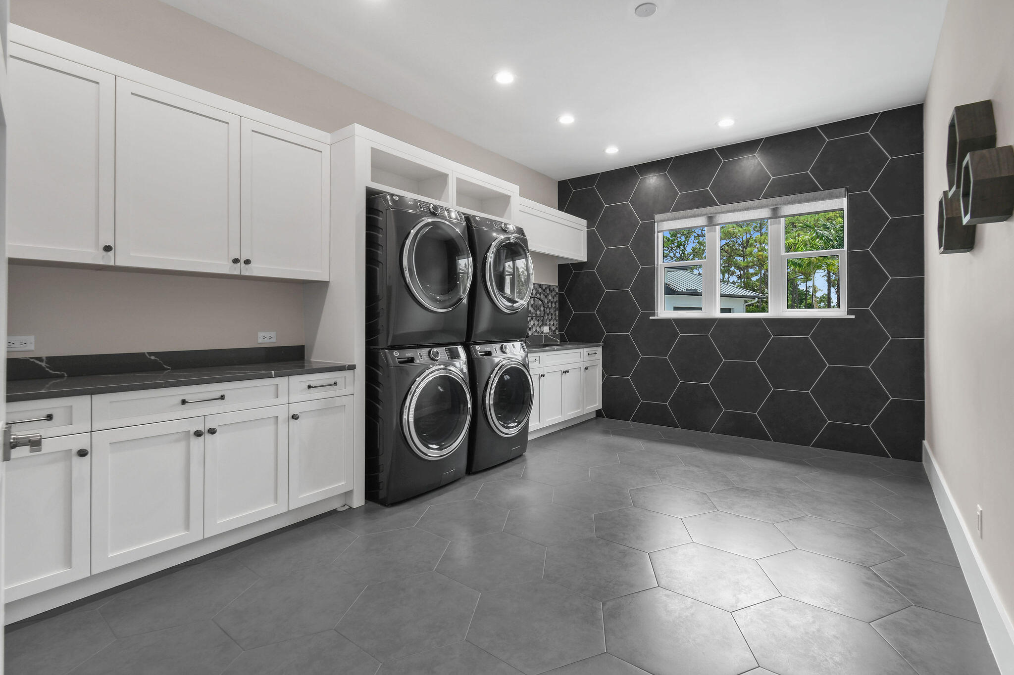 6219 Southeast Moss Ridge Pointe Hobe Sound, FL 33455 - Photo 53 of 108 a utility room with dryer and washer