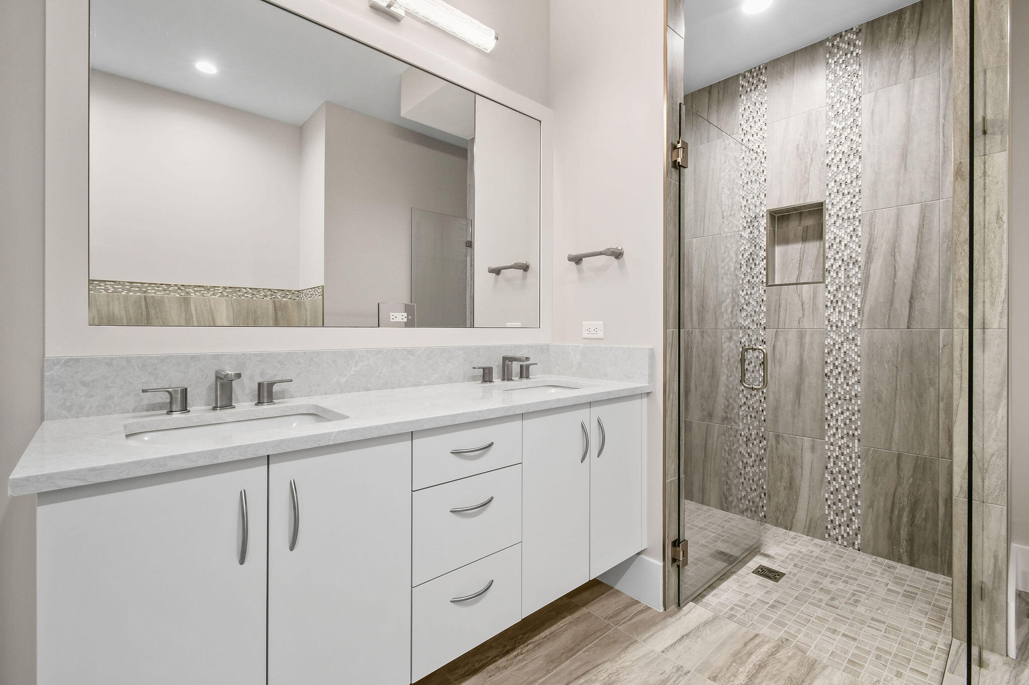 6219 Southeast Moss Ridge Pointe Hobe Sound, FL 33455 - Photo 74 of 108 a bathroom with a double vanity sink mirror and shower