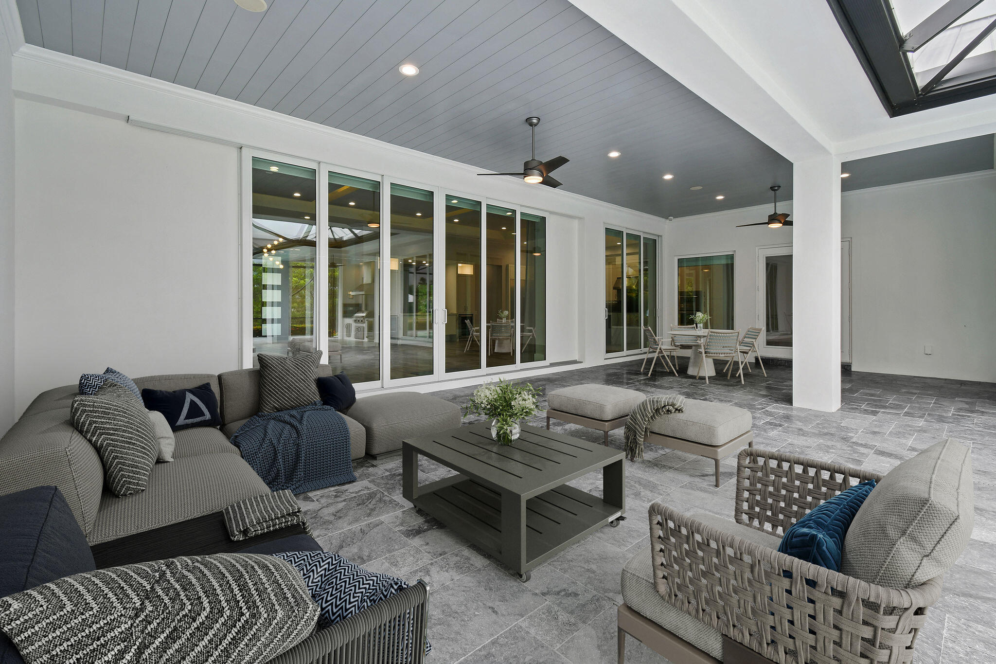 6219 Southeast Moss Ridge Pointe Hobe Sound, FL 33455 - Photo 78 of 108 a living room with furniture and large windows