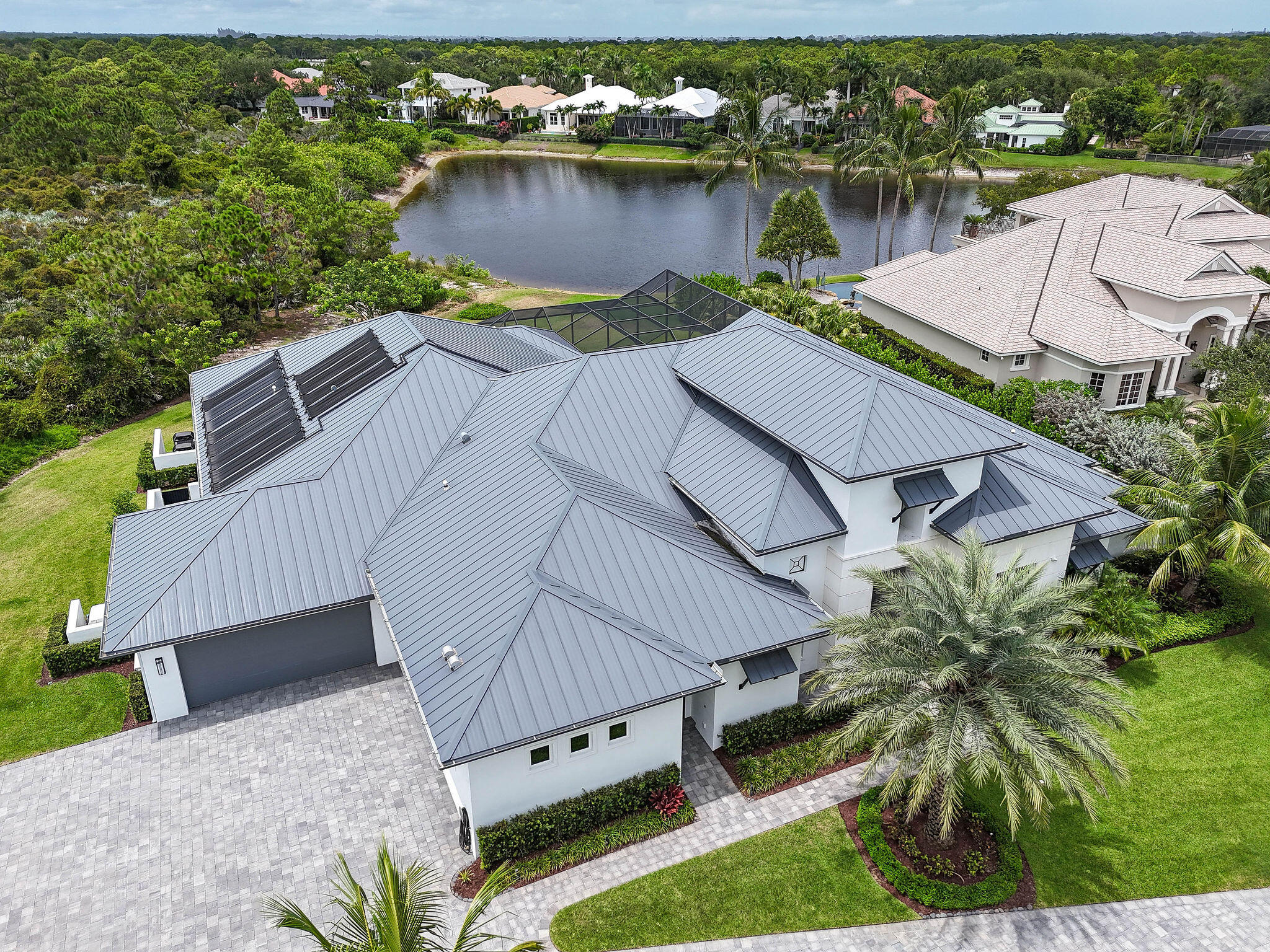 6219 Southeast Moss Ridge Pointe Hobe Sound, FL 33455 - Photo 96 of 108 an aerial view of house with yard and lake view