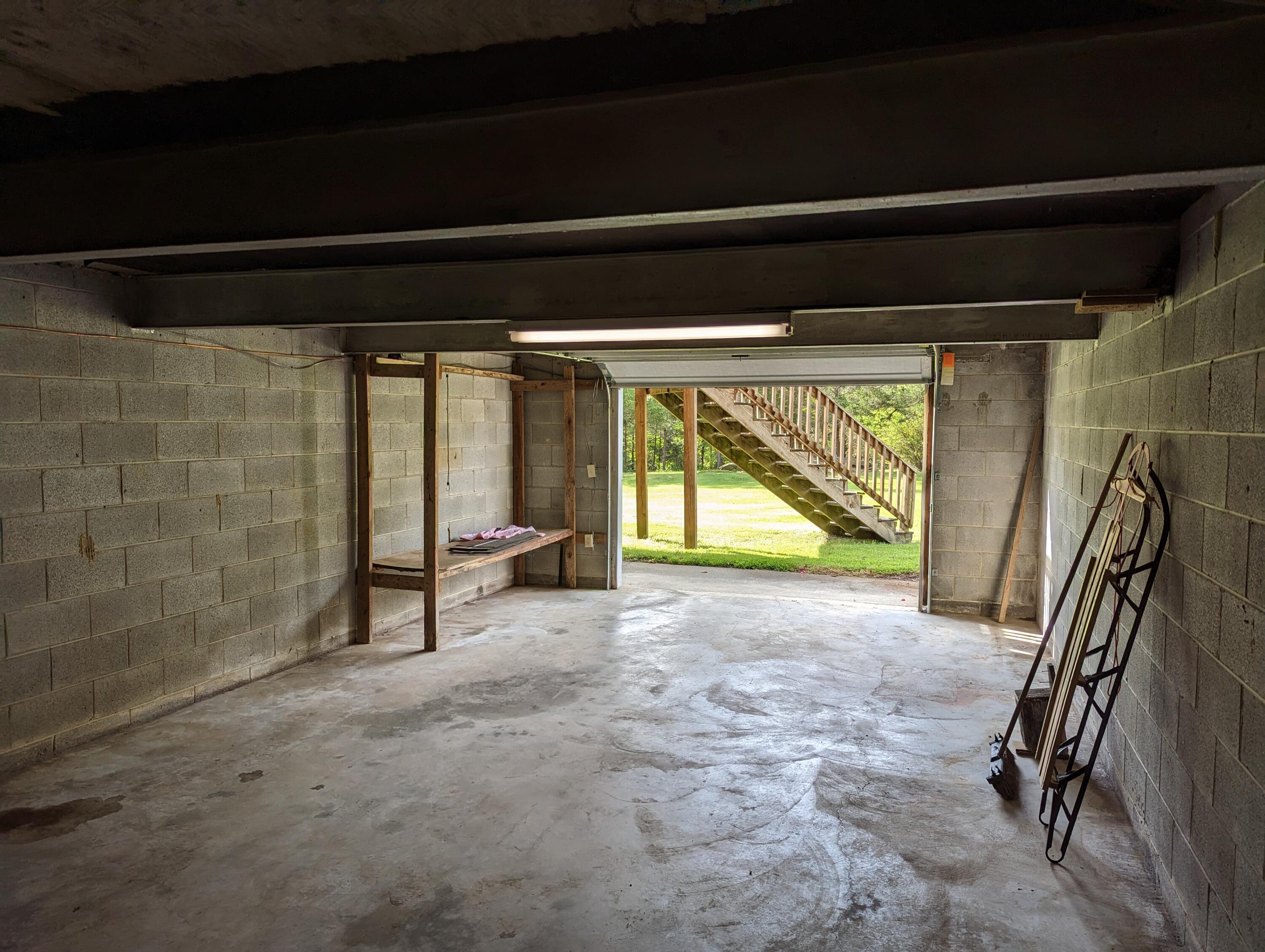 7214 6 Mile Post Road Rocky Mount, VA 24151 - Photo 27 of 45 a view of empty room with floor to ceiling window and stairs