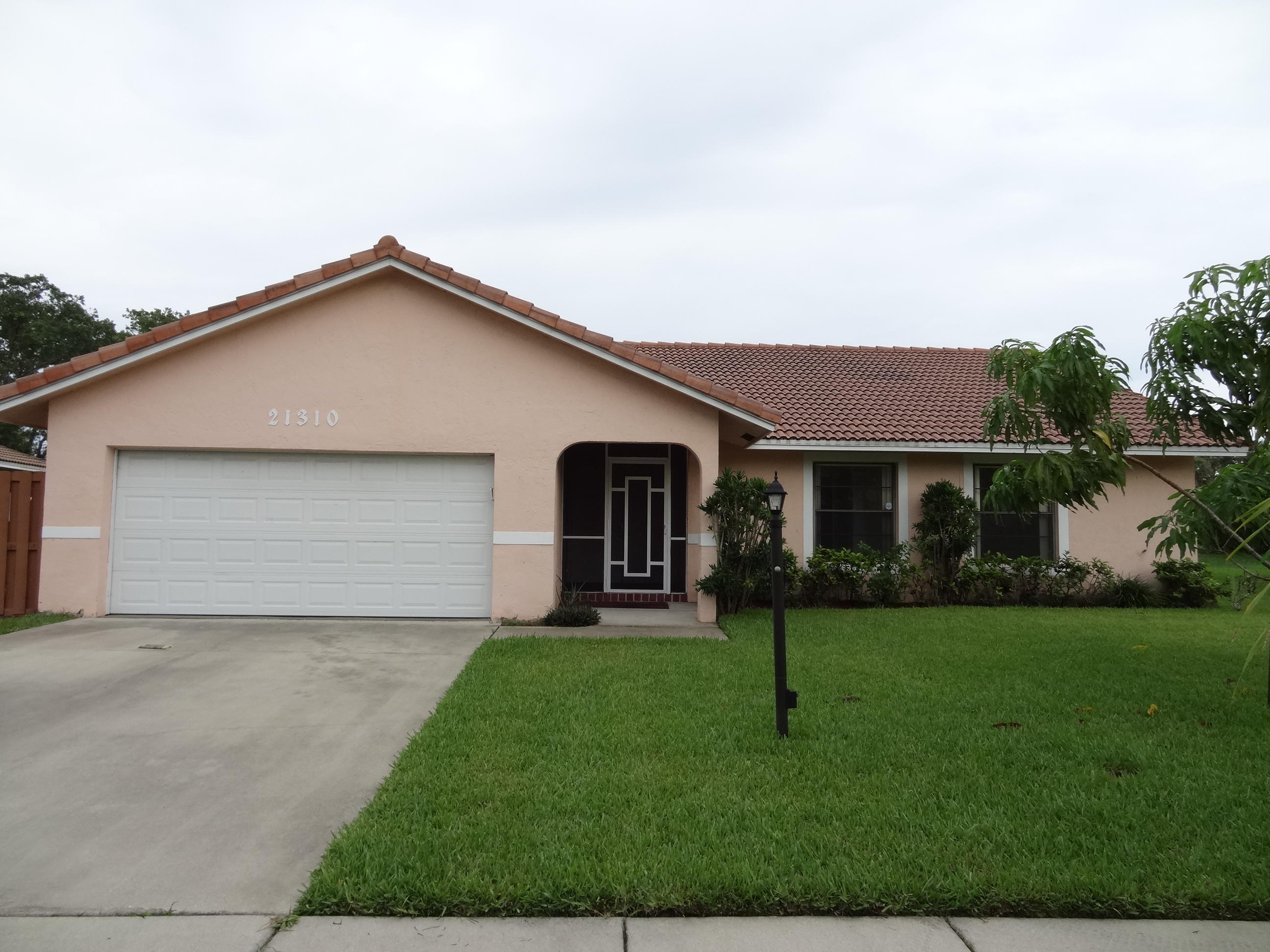21310 Chinaberry Drive Boca Raton, FL 33428 - Photo 1 of 34 Front